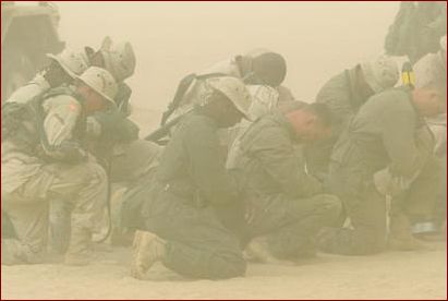praying in a sandstorm