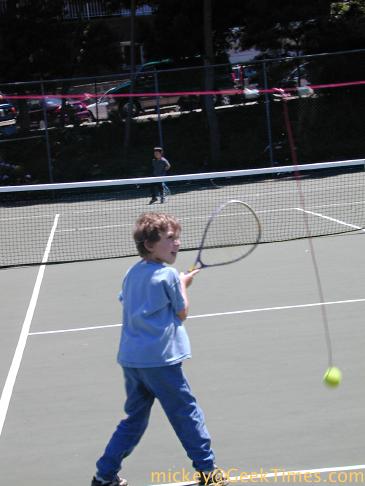 Isaac plays tennis