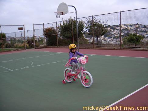 Lila rides her bicycle