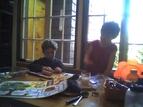Isaac and Lila do crafts