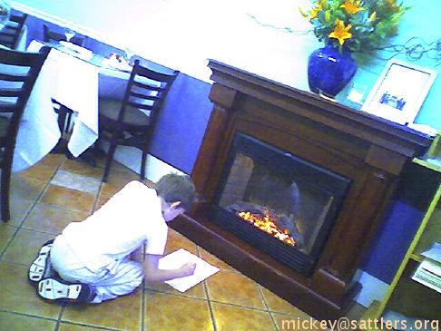 Isaac enjoys fireplace at Bursa Kabab, West Portal