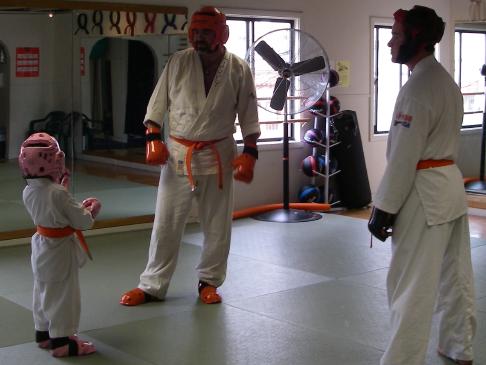 first sparring picture, Hapkido. Jacob Mazzullo at right