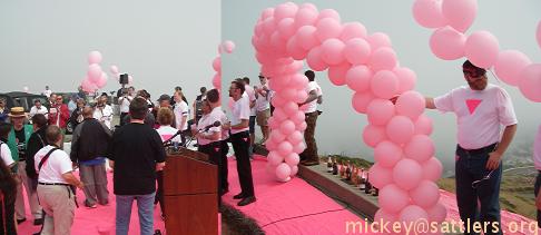 Pink Triangle: balloons and podium