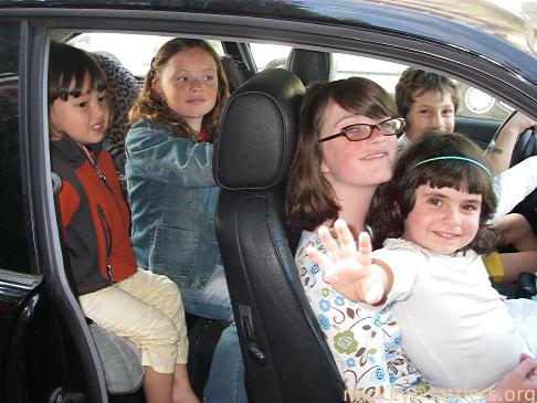 Muir-Muir, Natalie, Kaeli, Isaac, and the birthday girl in Rose's car