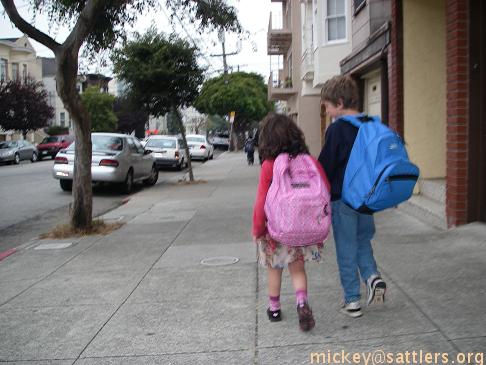 Lila & Isaac walking to school
