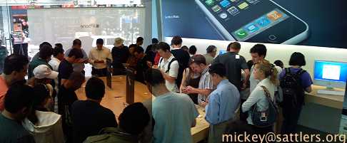 iPhone crowd inside Apple store