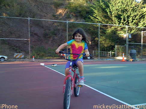 Lila rides a two-wheeler @ Corona Heights playground