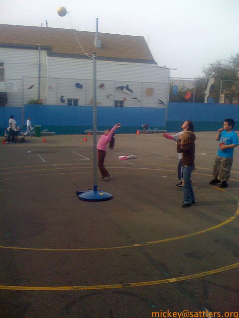 Lila plays tetherball at school