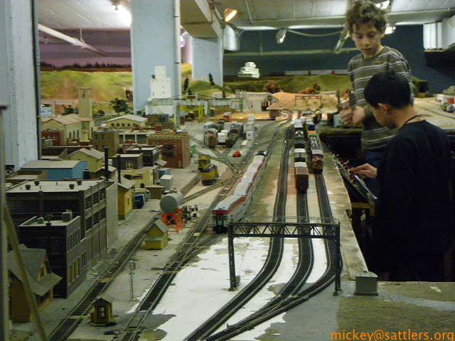 Isaac and Eric setting up another train to run.