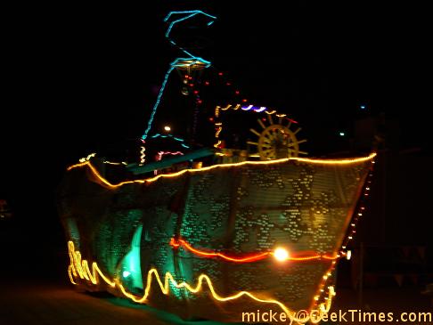nighttime lighted boat art car