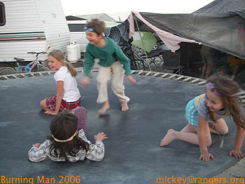 Burning Man 2006: Lila & Isaac on Kidsville trampoline
