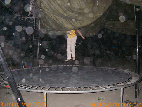 Burning Man 2006: Isaac, late at night, on a trampoline