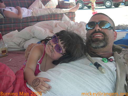 Burning Man 2006: Lila & Papa have an art car cuddle