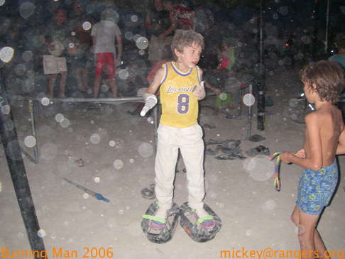 Burning Man 2006: Isaac on moon jumpers