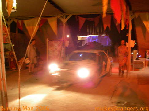Burning Man 2006: nighttime: driving into Center Camp Café
