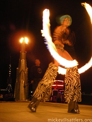 Burning Man 2007: stilt-walking fire dancer 