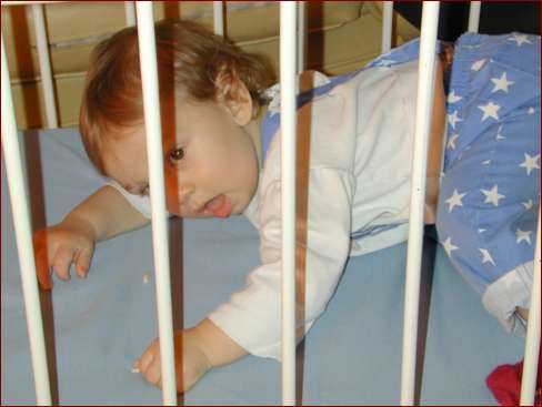 Isaac in crib
